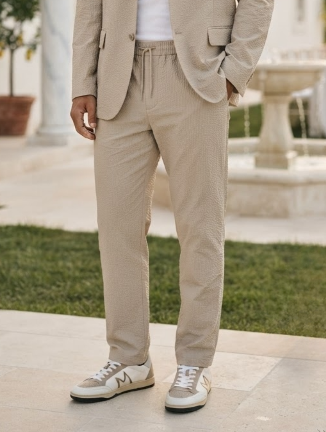 Sand pants with drawstring on a white background
