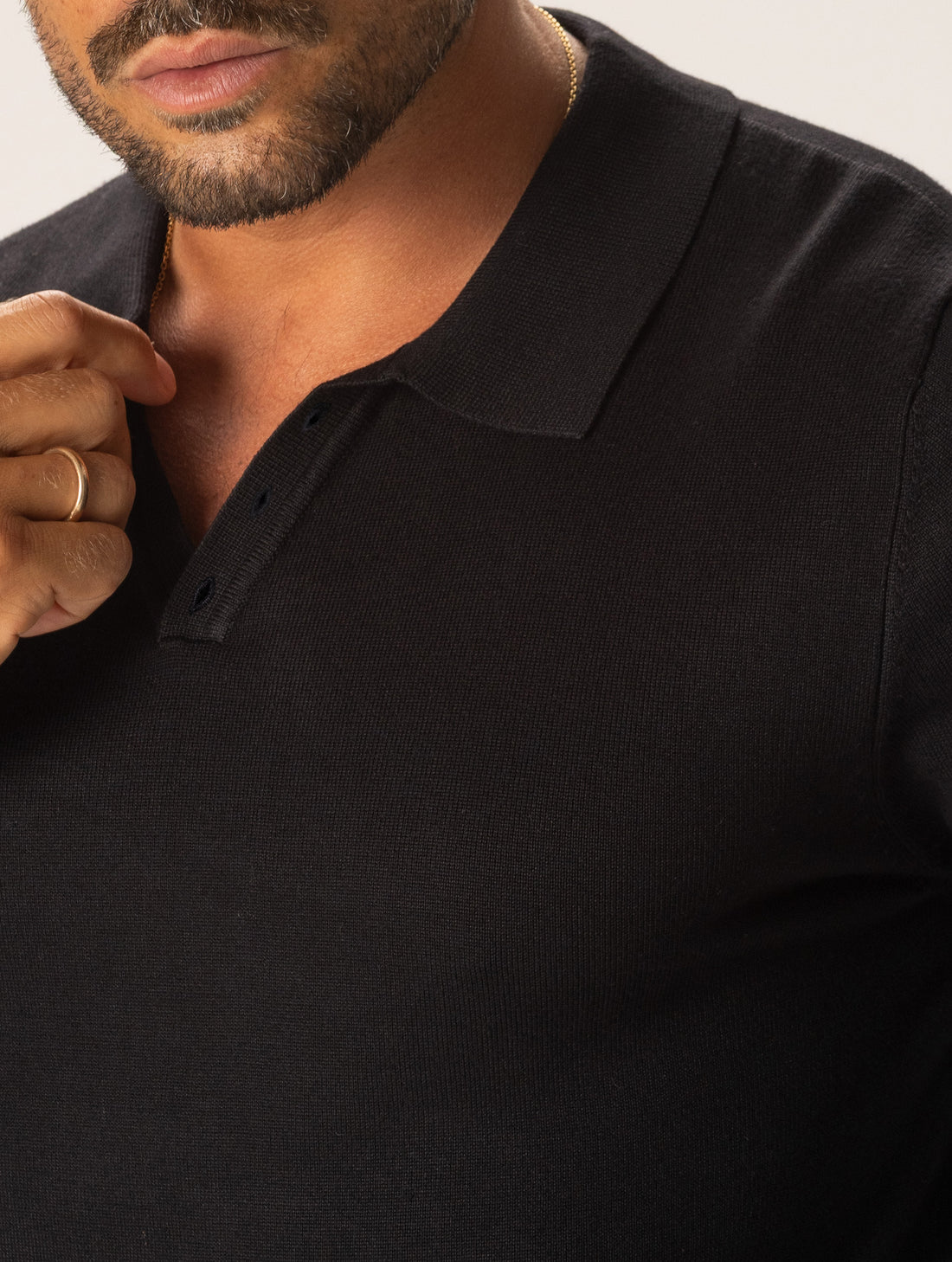 OSCAR POLO SWEATER IN BLACK