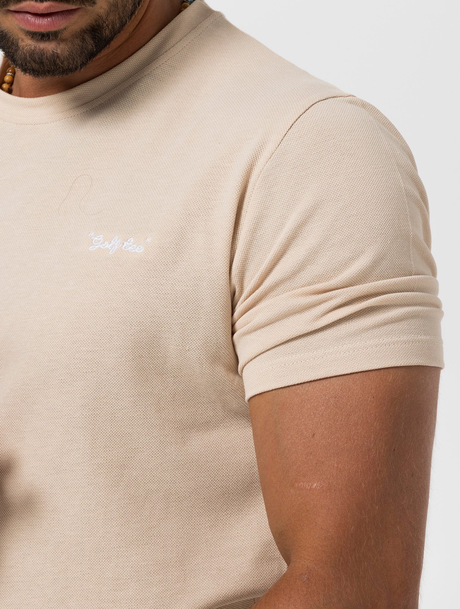 BEIGE BESTICKTES GOLF-T-SHIRT