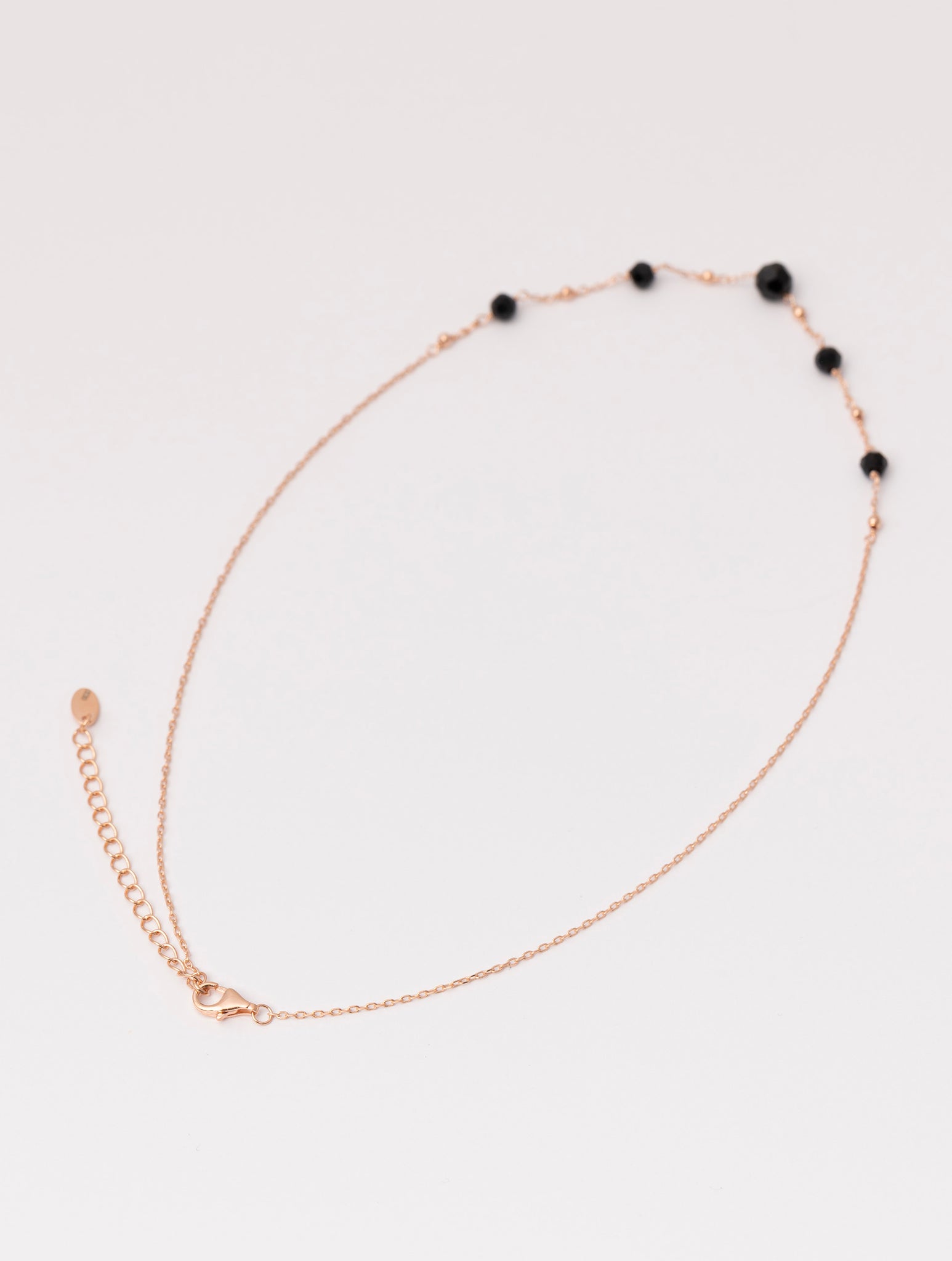 ABBEY NECKLACE IN ROSE GOLD AND BLACK STONES