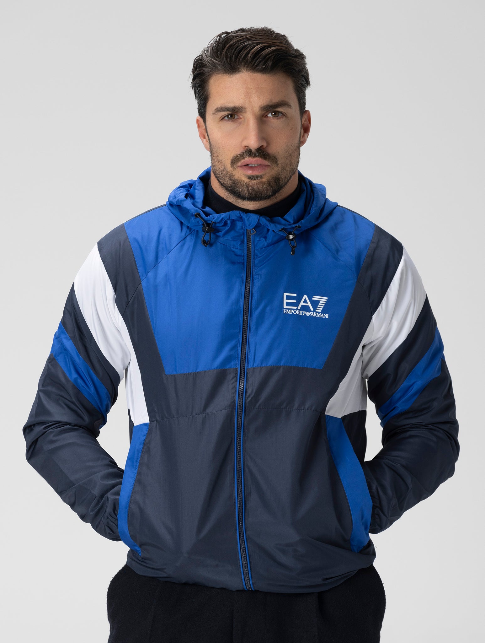 EA7 WATERPROOF JACKET IN BLUE AND WHITE