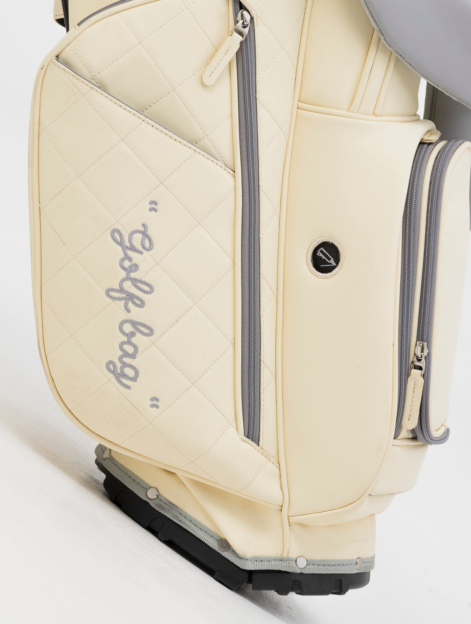 BOLSA DE GOLF NOHOW EN CREMA CON CREMALLERAS GRISES EXCLUSIVAS