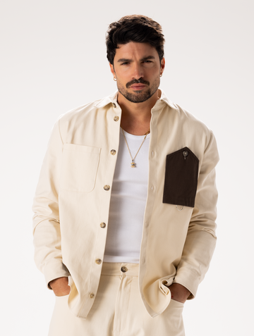 Man wearing cream overshirt