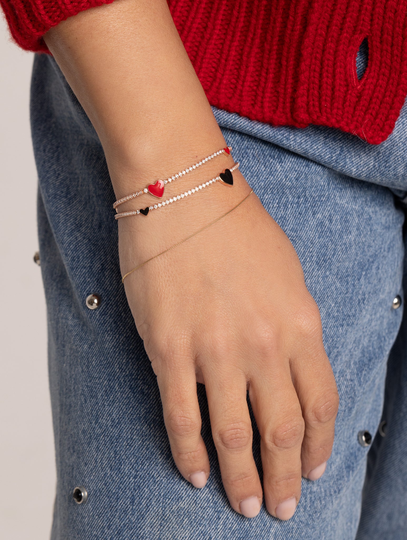 CLIZIA BRACELET EN COULEUR OR ROSE AVEC COEURS ROUGES