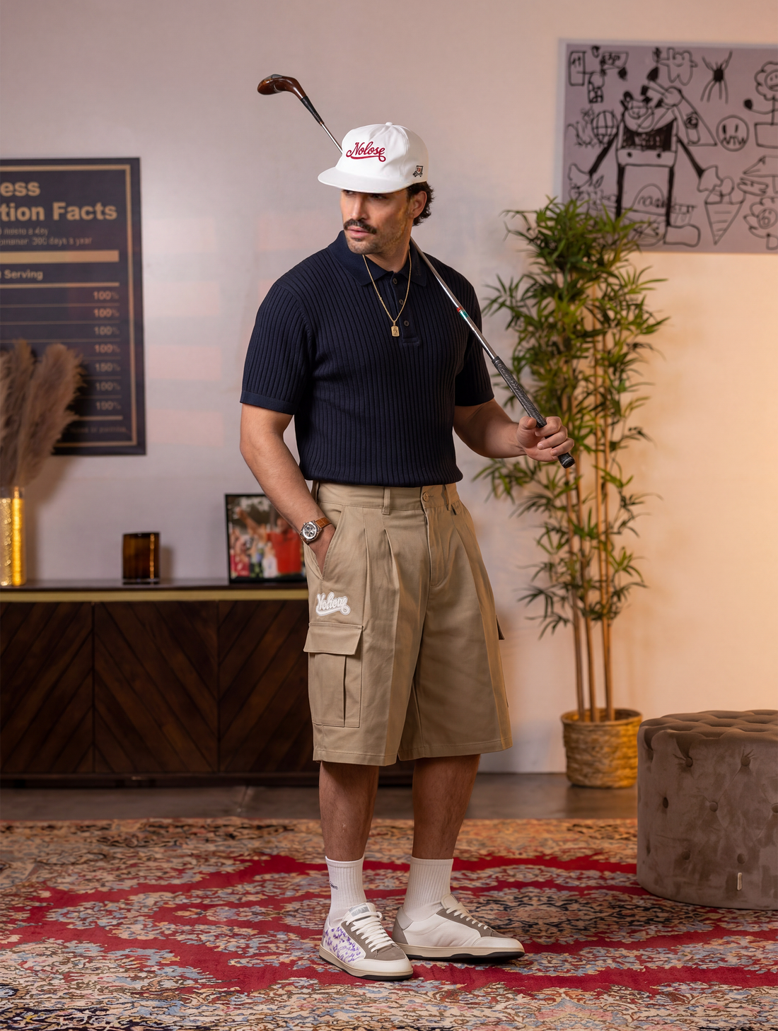 POLO À COULISSES AVEC BRODERIE BLEUE