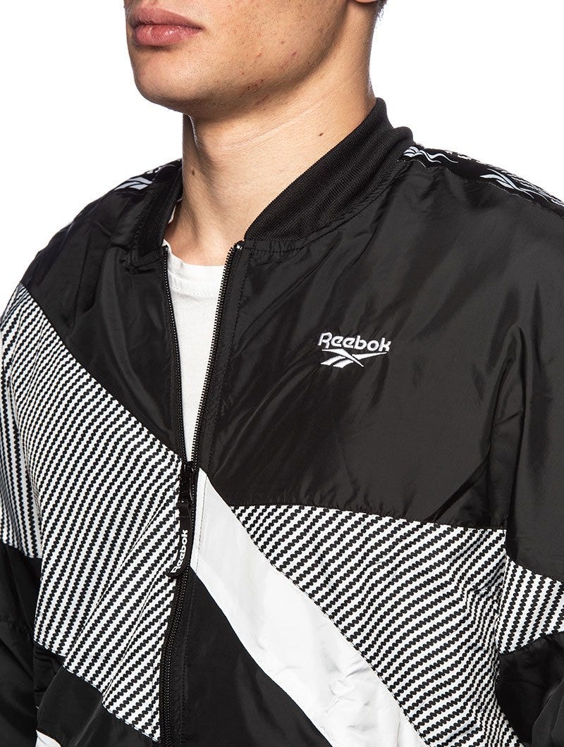 Reebok black hot sale and white jacket