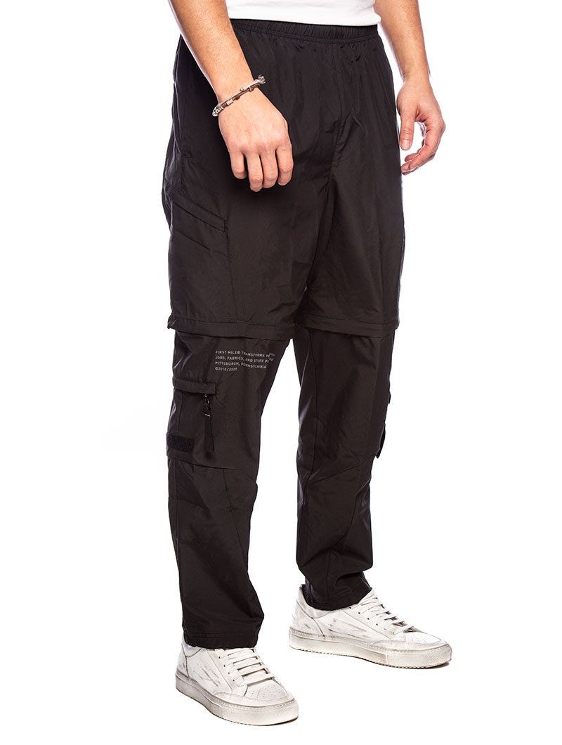 FIRST MILE 2IN1 WOVEN SWEATPANTS IN BLACK